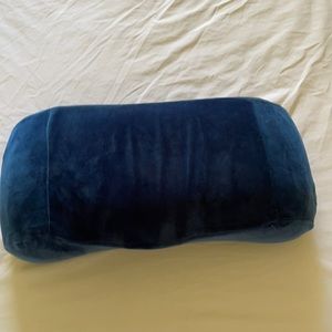 It is a wireless blue cushion massager
